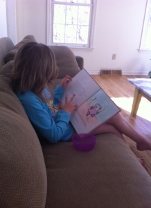 My little reader and budding artist.